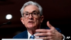 资料照片:美联储主席鲍威尔在参议院作证。(2021年11月30日)