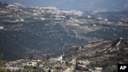 靠近土耳其边境线的叙利亚北部重镇金萨巴(资料照)