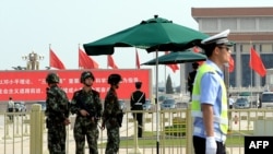 2014年8月3日,中国武装警察把守在北京天安门广场。
