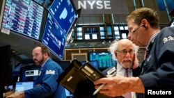 纽约股票交易所的交易商们。(2018年3月29日)