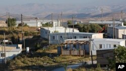 约旦河西岸巴勒斯坦城市拉马拉东边的一处未经批准的以色列定居点阿莫纳。(2016年11月16日)×