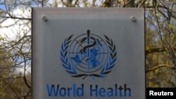 位于瑞士日内瓦的世界卫生组织(WHO)总部大楼外的WHO标识