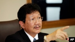 泰国国家安全委员会秘书长阿努西在曼谷召开的记者会上(2015年7月20日)。