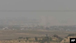 以色列官员2024年5月21日没收美联社设备之前,美联社的视频截图显示从以色列南部看到的加沙北部。(美联社照片)