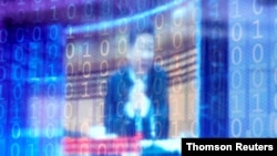 资料照片:在温州世界互联网大会上,一个有数字式装饰的屏幕显示着中国领导人习近平。(2020年11月23日)