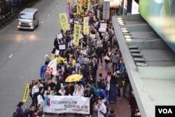 民陣估計約1,000人參與遊行 (美國之音湯惠芸拍攝)