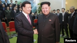 朝鲜领导人金正恩会见中共政治局常委刘云山率领的中共访朝代表团 (2015年10月)