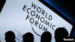1月23日,在瑞士达沃斯举行的世界经济论坛的一场讨论会
