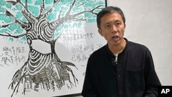 资料照:香港知名媒体人区家麟