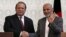 Afghan President Ashraf Ghani (R) shakes hands with Pakistani Prime Minister Nawaz Sharif after a news conference in Kabul, May 12, 2015. 