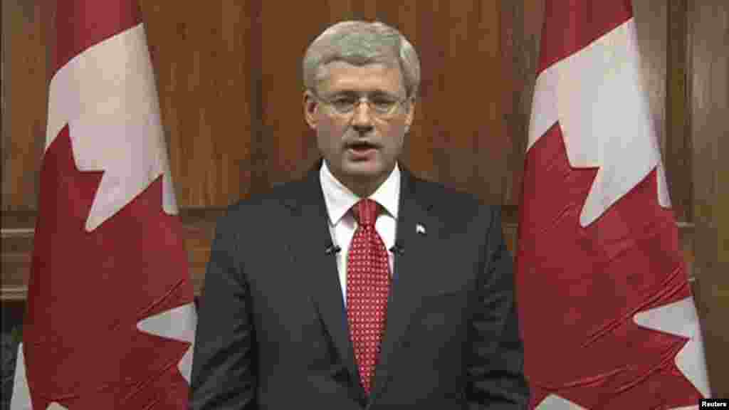 Canadian Prime Minister Stephen Harper speaks during a nationally televised address on CBC saying that Canada will not be intimidated by a pair of attacks that killed two soldiers this week, Oct. 22, 2014.