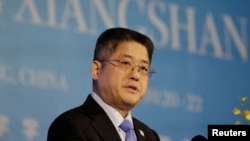 2019年时任中国外交部副部长的乐玉成在北京一个论坛上发表讲话。(资料照片,2019年10月22日)