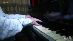 高科技让盲人乐手通过感觉跟随乐队指挥 高科技让盲人乐手通过感觉跟随乐队指挥