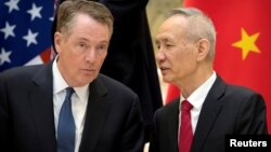 美国贸易代表莱特希泽与中国副总理刘鹤2019年2月15日在北京钓鱼台国宾馆交谈。