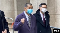 资料照片:香港民主活动人士、传媒大亨黎智英抵达香港终审法院。(2020年12月31日)