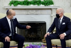 以色列总理贝内特与美国总统拜登在白宫举行会晤。(2021年8月2日)