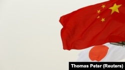 (资料照)中日两国国旗。