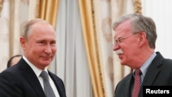 博尔顿2018年10月23日会见普京(路透社)