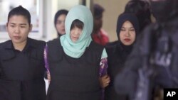 Cô Đoàn Thi Hương khi ra tòa hồi cuối tháng 6/2018