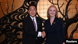 英国新首相特拉斯2022年9月20日在纽约出席联合国大会期间会见日本首相岸田文雄。(媒体联访照片)