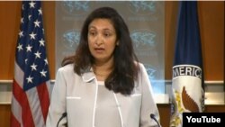 与中国外交部国际司司长李军华共同主持美中第18次人权对话的美国国务院负责民主人权与劳工事务代理助理国务卿泽雅