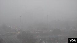 阴霾下的北京,白天宛如黑夜(资料照片)