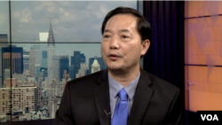 红色通缉令通缉犯、浙江昌大进出口有限公司经理邱耿敏(美国之音恰克拍摄)