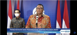 Anggota Bawaslu RI, Fritz Edward Siregar saat melaporkan temuan pelanggaran Pilkada di internet, Rabu 18 November 2020. (Foto:VOA)