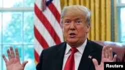 特朗普2018年10月10日在白宫见记者(路透社)