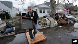 A mourner is seen through a barricade in Kyiv's Independent Square.
