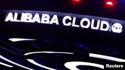 资料照:深圳举办的阿里巴巴双十一购物节的阿里云服务展台。(2016年11月11日)