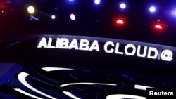 资料照:深圳举办的阿里巴巴双十一购物节的阿里云服务展台。(2016年11月11日)