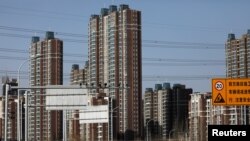 资料照:北京的一处居民区大楼(2021年1月13日)