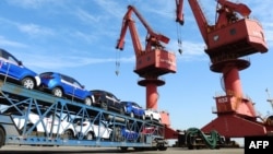 2018年5月31日中国连云港里即将出口的汽车(法新社)