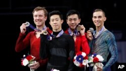 奥运会美国花样滑冰参赛选手,右起第二人是周知方(Vincent Zhou)。(2018年1月6日)