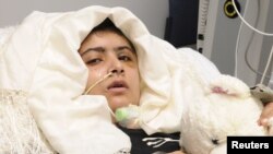 Pro-Russian separatists man a road checkpoint outside the town of Lysychansk in the Luhansk region of eastern Ukraine, June 24, 2014.