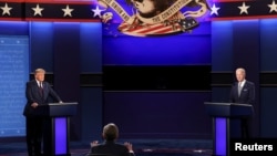 美国总统特朗普和民主党总统候选人拜登参加了在美国俄亥俄州克利夫兰凯斯西储大学举行的2020年首次总统竞选辩论。(2020年9月29日)