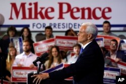 Kandidat presiden dari Partai Republik mantan Wapres AS Mike Pence, berbicara pada acara kampanye di Ankeny, Iowa, 7 Juni 2023. (AP / Charlie Neibergall)