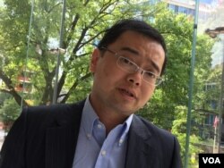 上海国际问题研究院薛晨博士(美国之音燕青拍摄)