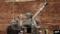 Một khẩu trọng pháo di động của Israel được bố trí gần biên giới với Syria trong vùng Cao Nguyên Golan Israel chiếm đóng, 27/1/15