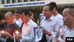 点起蜡烛悼念李旺阳 (美国之音容易)