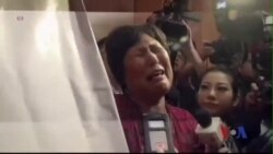 Thân nhân hành khách TQ phẫn nộ vì tiến độ tìm kiếm máy bay chậm chạp Thân nhân hành khách TQ phẫn nộ vì tiến độ tìm kiếm máy bay chậm chạp