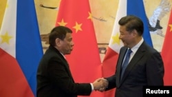 杜特尔特上任后不久就在2016年10月访问北京(路透社)