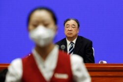 中国国家卫生健康委员会主任马晓伟在白皮书发布会上。(2020年6月7日)