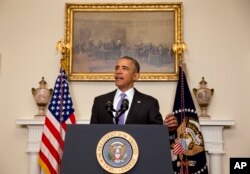 President Barack Obama speaks about the release of Americans by Iran, in the Cabinet Room of the White House in Washington, Jan. 17, 2016.