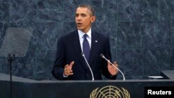 Students welcome United Nations Children's Fund (UNICEF) Ivory Coast Representative Adele Khudr as she arrives for a Ebola awareness drive in Gueupleu, Man, in western Ivory Coast, Nov. 3, 2014.