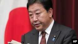 Thủ tướng Nhật Bản Yoshihiko Noda nói chuyện tại một cuộc họp báo ở Tokyo 24/8/12