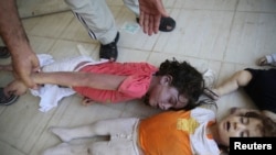 活动人士称，8月21日在大马士革郊区死于毒气袭击的儿童的遗体