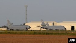 File - US warplanes are seen at the Moron air base, near Seville.