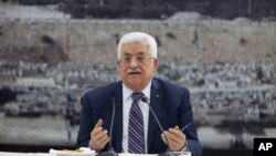 FILE - Palestinian President Mahmoud Abbas talks during a leadership meeting in Ramallah.